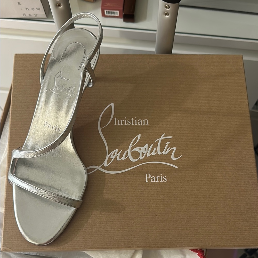 Brand new Christian Louboutin Rosalie Leather 55MM Sandal Heels in silver
